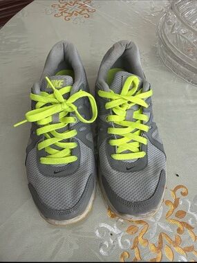 Nike Women’s Gray Athletic Sneakers with Neon Yellow Laces